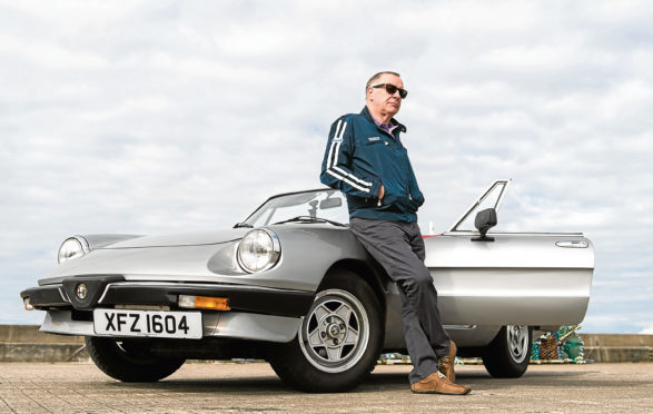 Brian Watt with his 1986 Alfa Romeo Spider. Photograph by Jason Hedges