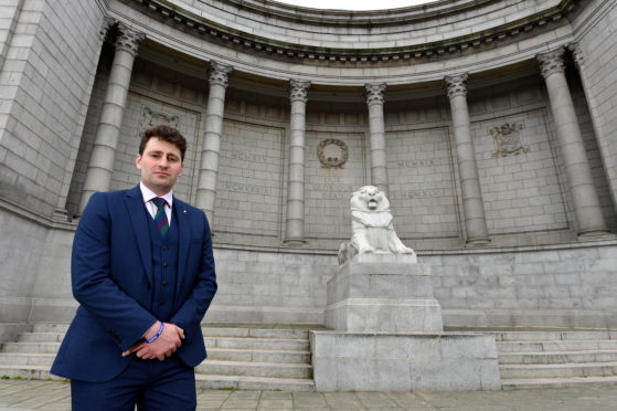 Councillor Michael Hutchison at the memorial.

Picture by Kenny Elrick.