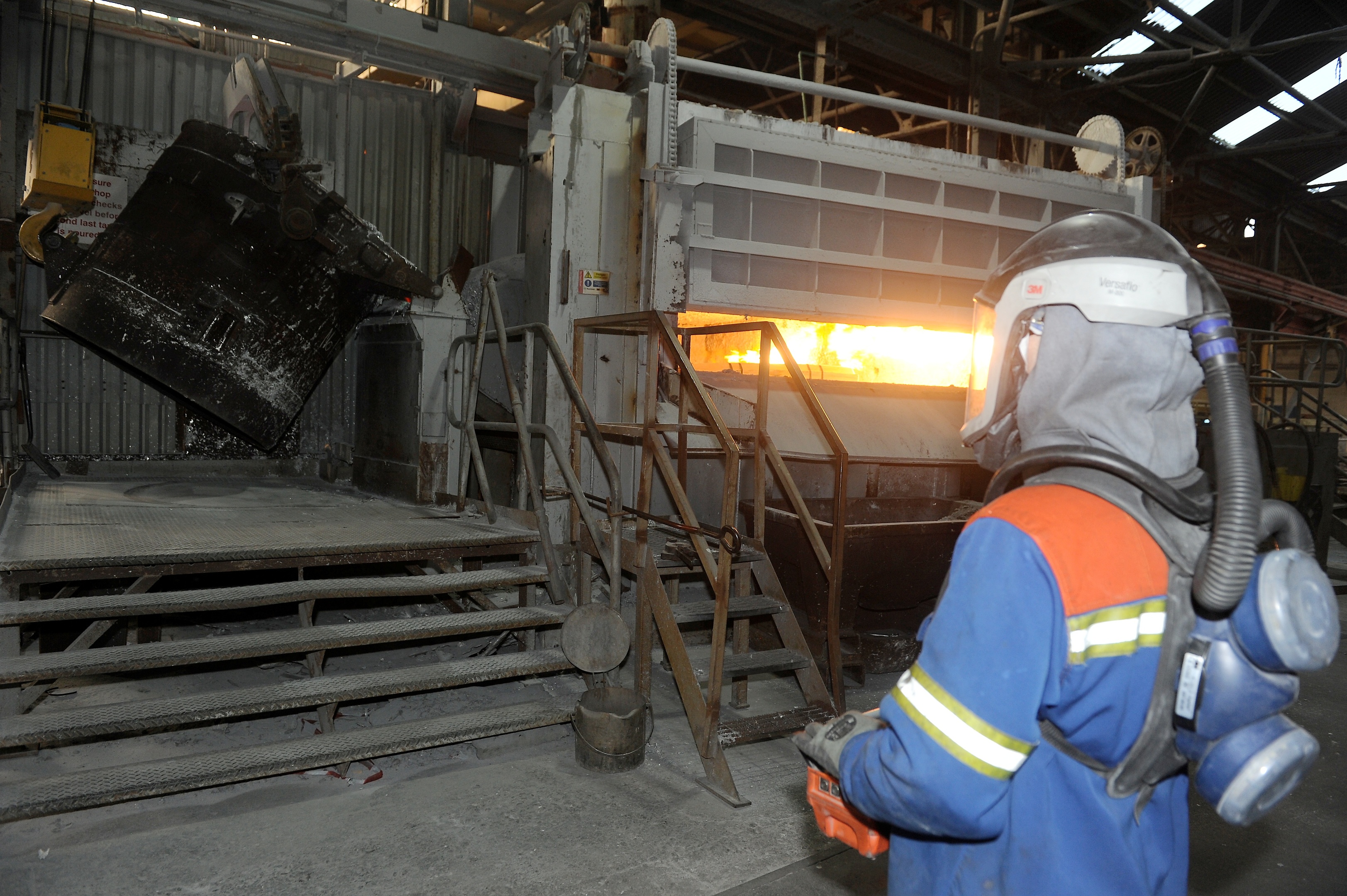 Fort William Aluminium Smelter. Casting Operator Michael Hartley at work pouring molten aluminium in the factory.
Picture by Sandy McCook.