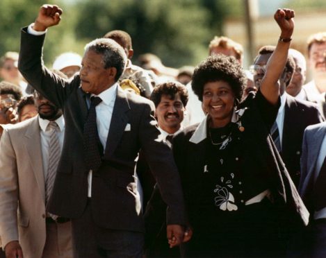 Winnie Mandela, walking hand in hand with her late husband Nelson upon his release from Victor Verster Prison, in Paari, South Africa 1990.