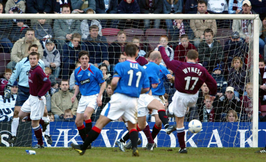 Dennis Wyness (far right) scores the equalising goal against Rangers in March 2004.