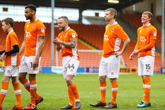 Kevin Stuart (second right) from Dufftown, as a mascot during a football match between Blackpool FC and Bradford AFC.