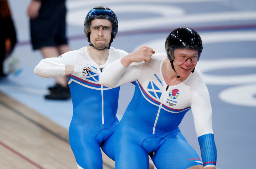 Scotland's Neil Fachie (left) and pilot Matt Rotherham celebrate winning gold in the Men's B&VI 1000m time trial.