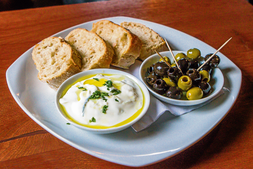 Tzatziki and olives with fresh bread