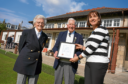 Ella and Jim Murray were presented with a commemorative certificate of their dedication to the sport by curling gold medallist Jackie Lockhart