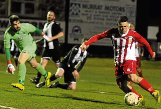 Scott Barbour is on the mark to make it 1-0 for Formartine United against Fraserburgh at Bellsea Park last night.