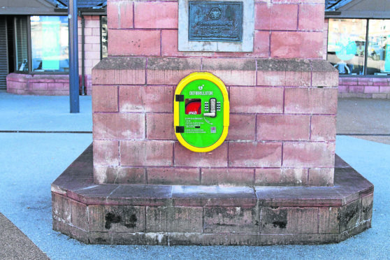 Defib machine located on the clock tower oban close to Oban Station.