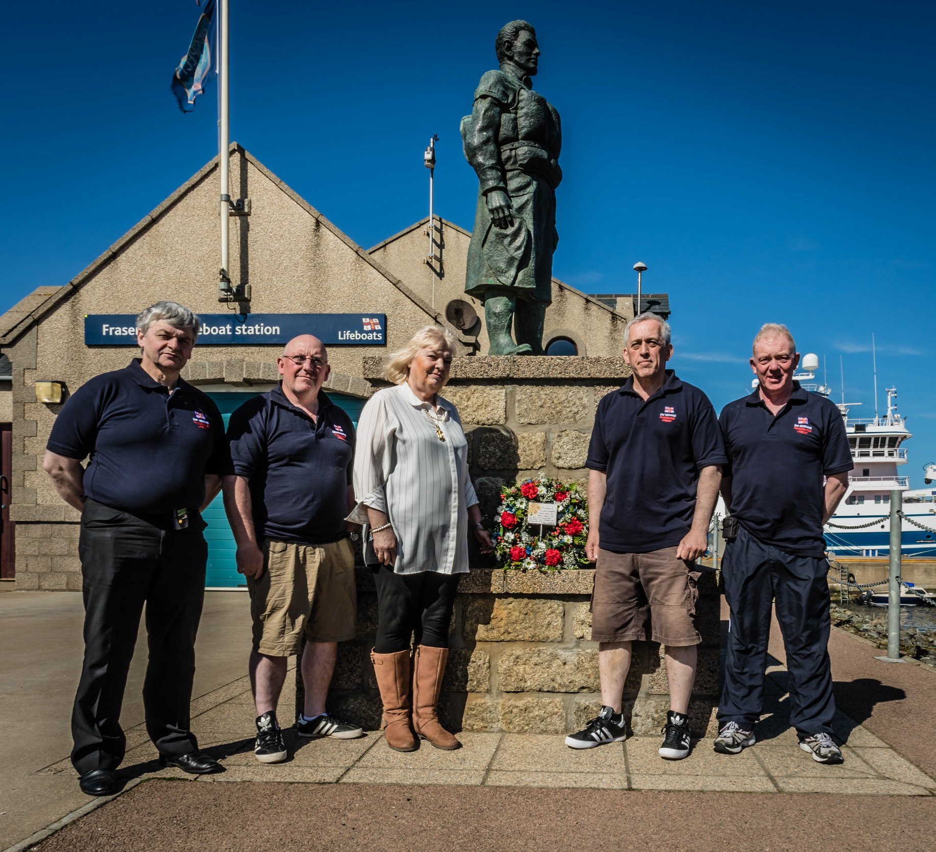 Anne Mould with members of the Fraserburgh Lifeboat Crew.
