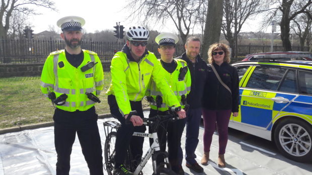 Sergeant Peter Henderson, PC Scott Leslie, PC Christopher Bain plus Jon Barron and Kelly Wiltshire of NESTRANS