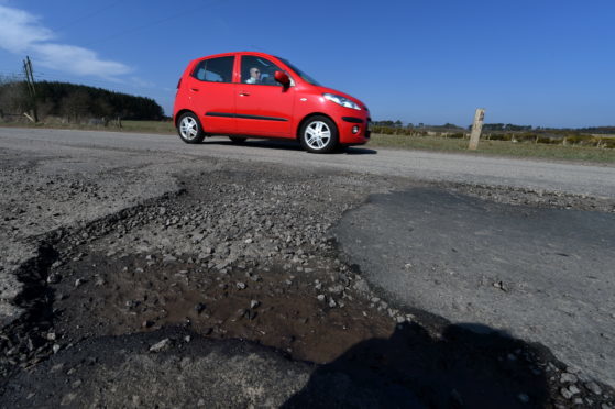 Potholes on the Netherley to Portlethen road near Lairhillock school