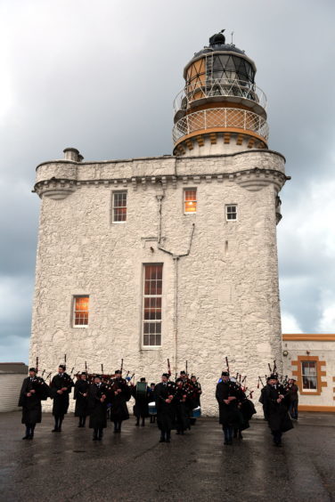 The Fraserburgh Royal British Legion Pipe Band play at the start of proceedings at the lighthouse.