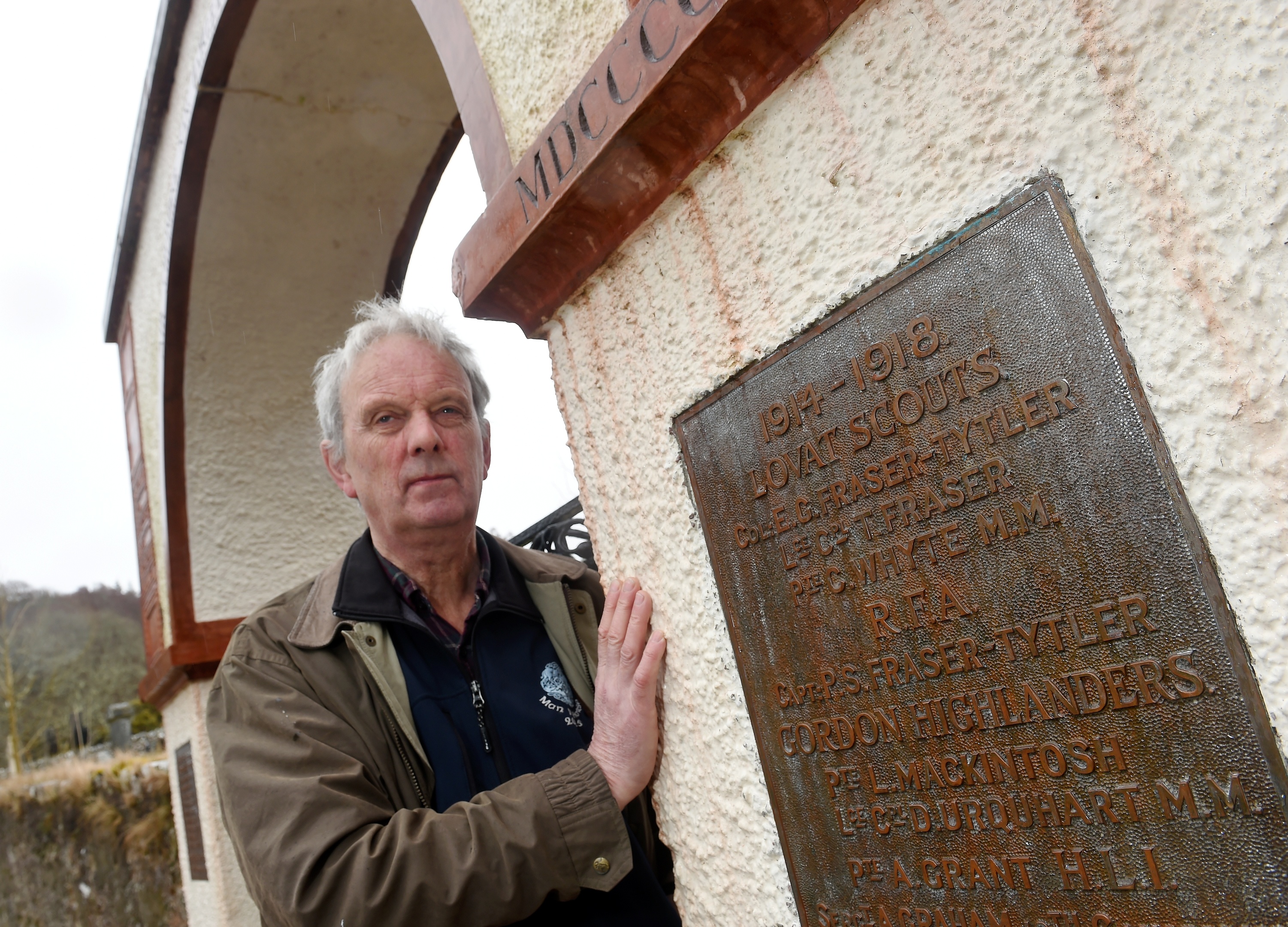 Iain Cameron, a member of the Dores and Essich Community Council with the Dores War Memorial which is to be restored to its original form.
Picture by Sandy McCook.