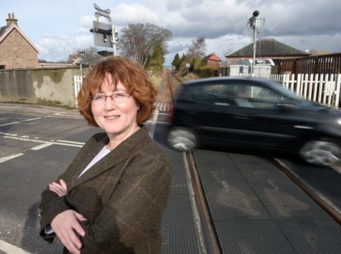 Councillor Angela MacLean at the crossing in Dingwall.