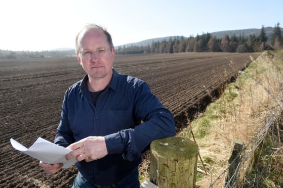 Inverness based architect Neil Sutherland on the site at Novar in Evanton