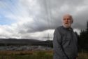 Steven Lanning of Auchterawe who is concerned along with neighbours over the proposed extension to the Fort Augustus sub station and its effect on house values and health.
Picture by Sandy McCook.