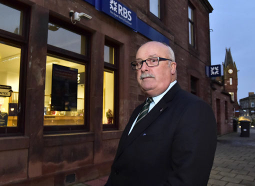 Cllr Alastair Forysth at the  RBS branch in Turriff.