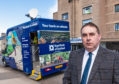 Heldon and Laich councillor James Allan outside the mobile bank in Lossiemouth.