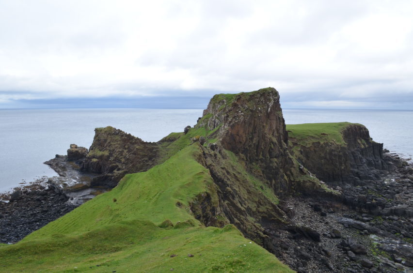 Embargoed to 0001 Tuesday April 03

Undated University of Edinburgh handout photo of Brothers Point the Isle of Skye. Dozens of newly discovered giant dinosaur footprints on a Scottish island are helping to shed light on the Jurassic reptiles' evolution. PRESS ASSOCIATION Photo. Picture date: Tuesday April 3, 2018. The 170 million-year-old tracks were made in a muddy lagoon off the north-east coast of what is now the Isle of Skye. Most of the prints were made by the "older cousins" of Tyrannosaurus rex, called theropods - which stood up to two metres tall - and by similarly sized long-necked sauropods. See PA story SCIENCE Dinosaurs. Photo credit should read: University of Edinburgh/PA Wire