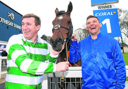 Former Celtic player Alan Stubbs (left) is pictured with former Rangers player Lee McCulloch as they preview this the Coral Scottish Grand National at Ayr Racecourse.