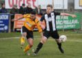 Fraserburgh's Andrew Hannar and Fort William's Barna Tot in action