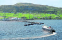 The Caledonian MacBrayne ferry, 'Hebrides' arrives in Uig, Skye from Harris and North Uist in the Outer Hebrides.