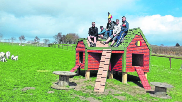 Students on a goat house at  Cantraybridge College where unpaid carer Susan Grigor works.