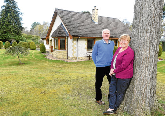 David & Anne Watson outside their home