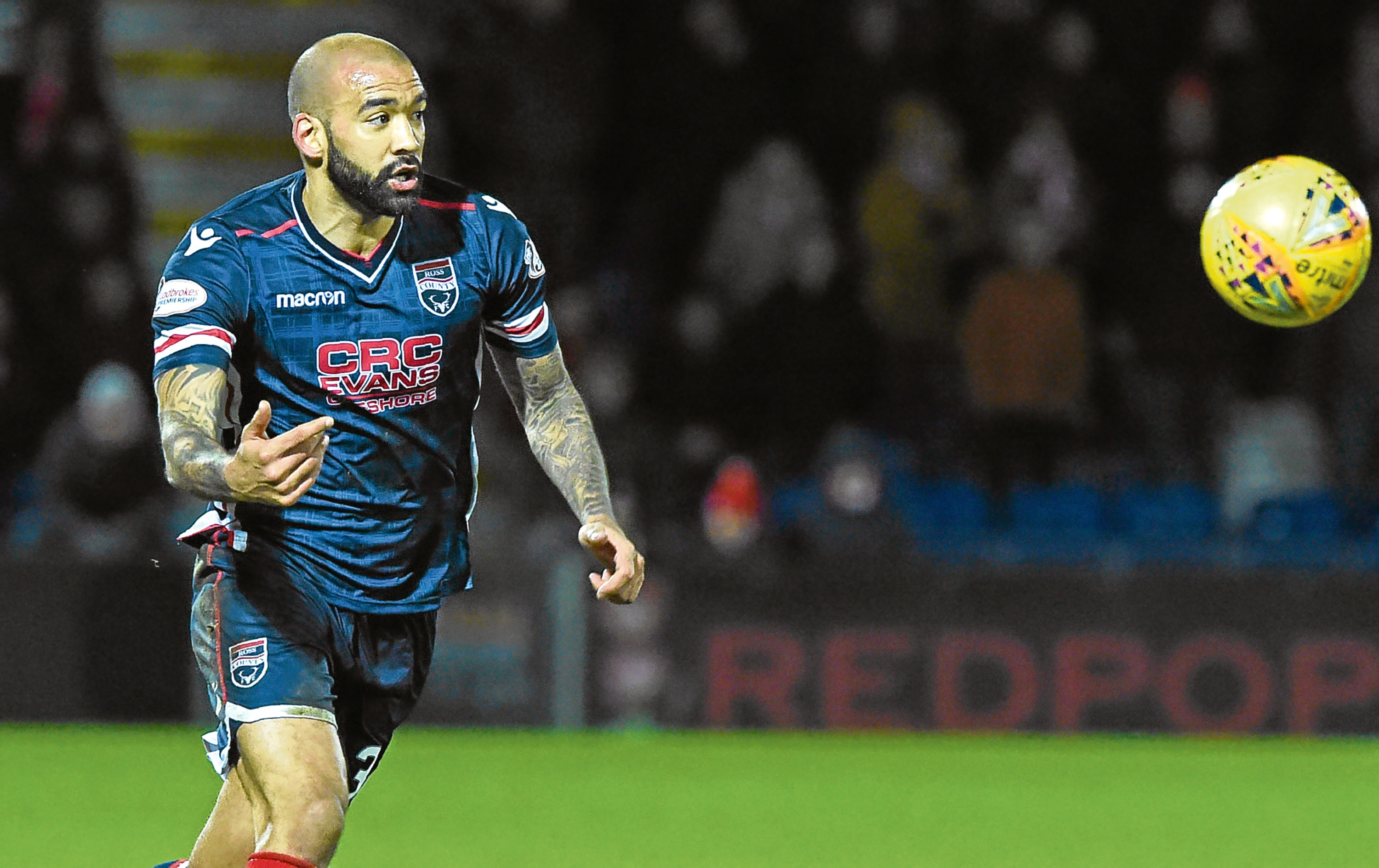 Liam Fontaine in action for Ross County.