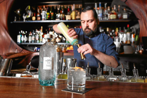 TORONTO, ON - APRIL 7: Vince Pollard poses with a flavoured gin and tonic at Bar Raval        (Andrew Francis Wallace/Toronto Star via Getty Images)