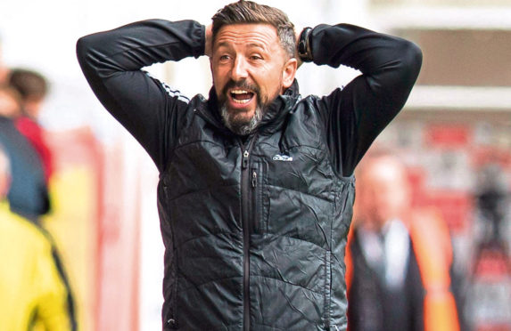 Aberdeen manager Derek McInnes hit back at Craign Levein.