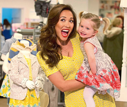 Myleene Klass who designs the BabyK range opens a new Mothercare.