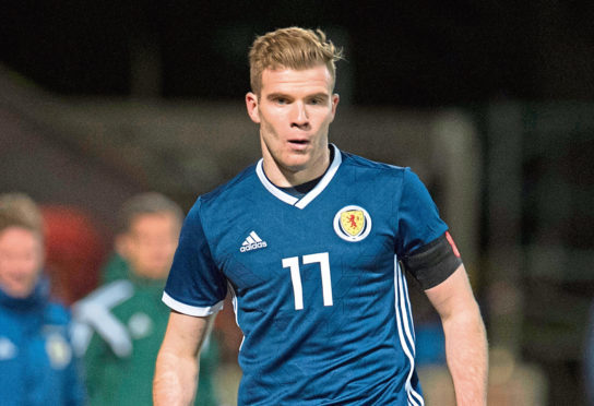 Chris Cadden in action for Scotland.