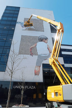 Nuart Aberdeen. Ernest Zacharevic working on his piece on Union Plaza.
12/04/18.
Picture by KATH FLANNERY