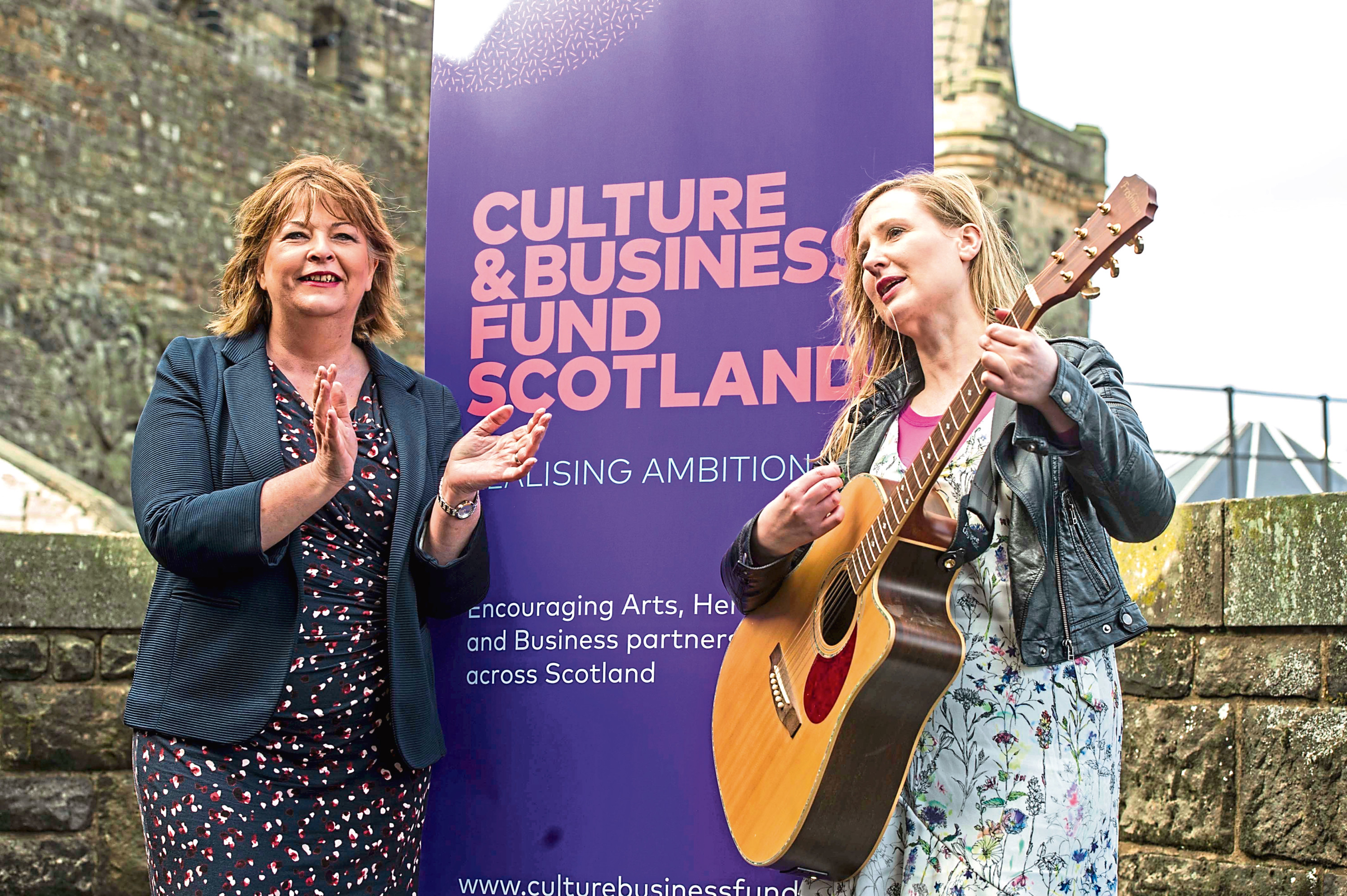 Culture Secretary Fiona Hyslop and musician Louise Quinn.