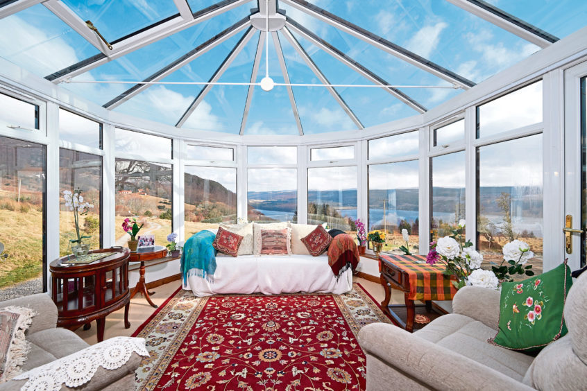 The conservatory provides spectacular views over iconic Loch Ness