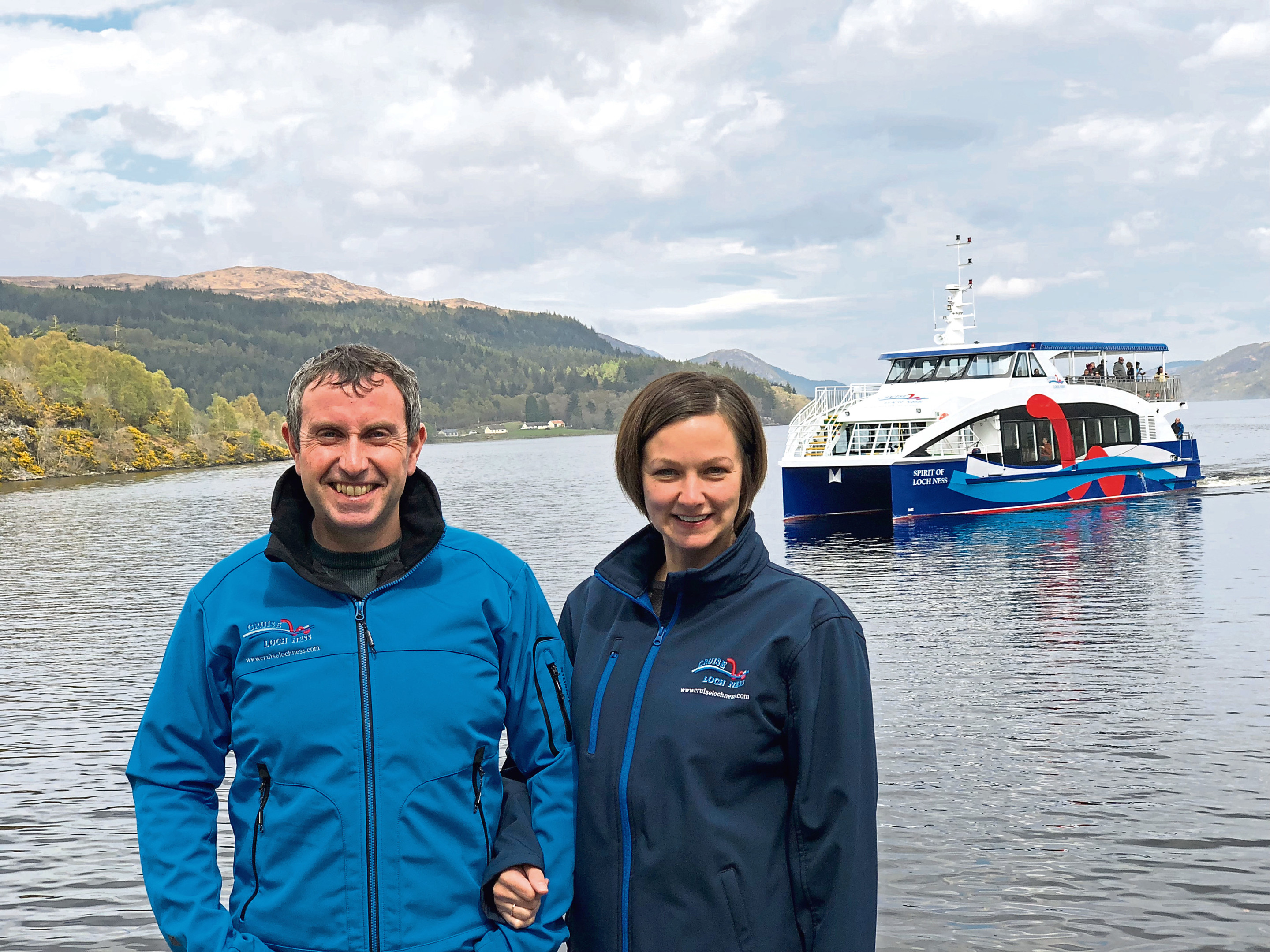 Ronald and Debi Mackenzie of Cruise Loch Ness with the new catamaran.