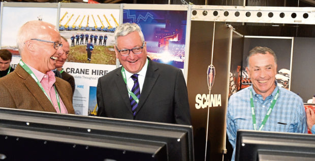 Ian Gatt, left, in a lighter moment with Fishing Minister Fergus Ewing at the AECC. Photograph by Jim Irvine