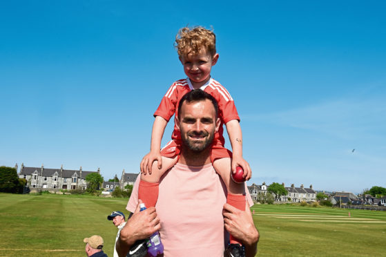 Aberdeen Fc goalkeeper, Joe Lewis with his son, Lenny at Mannofield cricket, Aberdeen.  
Picture by Jim Irvine  26-5-18