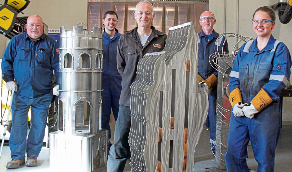 Jonathan Tyndall, Samuel Domingo, Brian McWilliam and Krista Kuke with the sculptures alongside lecturer Martin Summers