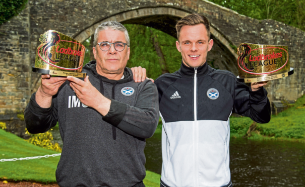 Ian McCall and Lawrence Shankland with their awards yesterday