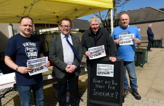 A stall with a petition against the decision not to move Aberdeenshire Councils headquarters to Inverurie.
Pictured from left, George Petrie, Councillor Neil Baillie, Hamish Vernal, Former Provost and Councillor for Inverurie and John Sangster.
Picture by Heather Fowlie.