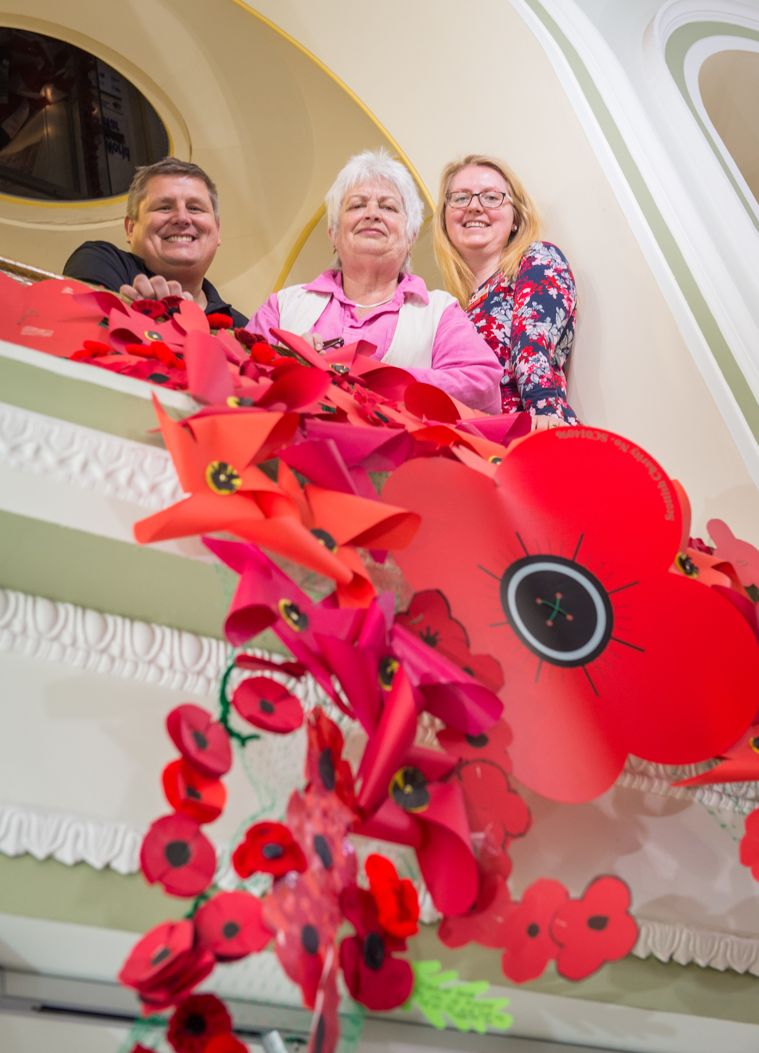 Gordon Michie, head of fundraising at Poppy Scotland, Elgin Museum volunteer Mary Shand and Frances Beveridge, regional fundraiser at Poppy Scotland, with the poppies at Elgin Museum.