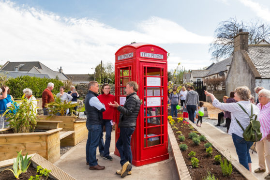 The opening ceremony of the Barren plot of rubble in Garmouth is transformed into sensory garden in village with beach and distillery themes.