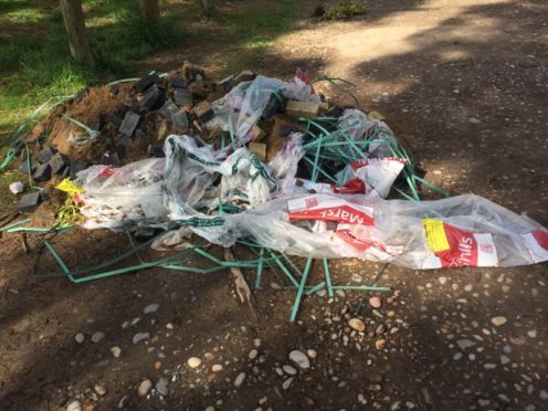 Fly-tipping reported at Lossie Forest in May 2018.