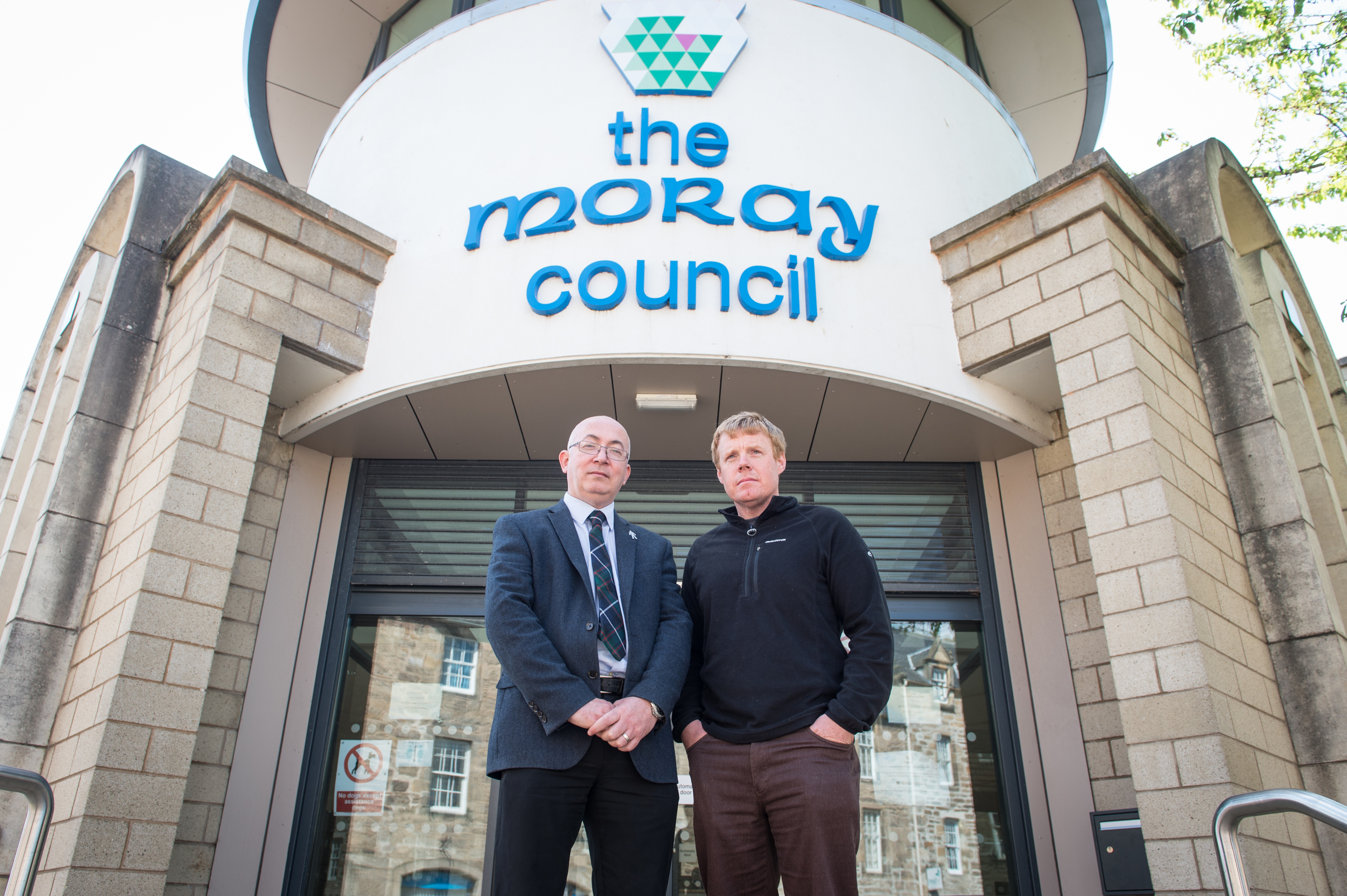 Conservative councillors Marc Macrae and Tim Eagle have threatened to quit the council's administration.