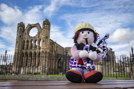 Morag the piper is a member of the hand-made group, commonly known as the “smallest pipe band in the world”, which has traditionally appeared at Piping at Forres