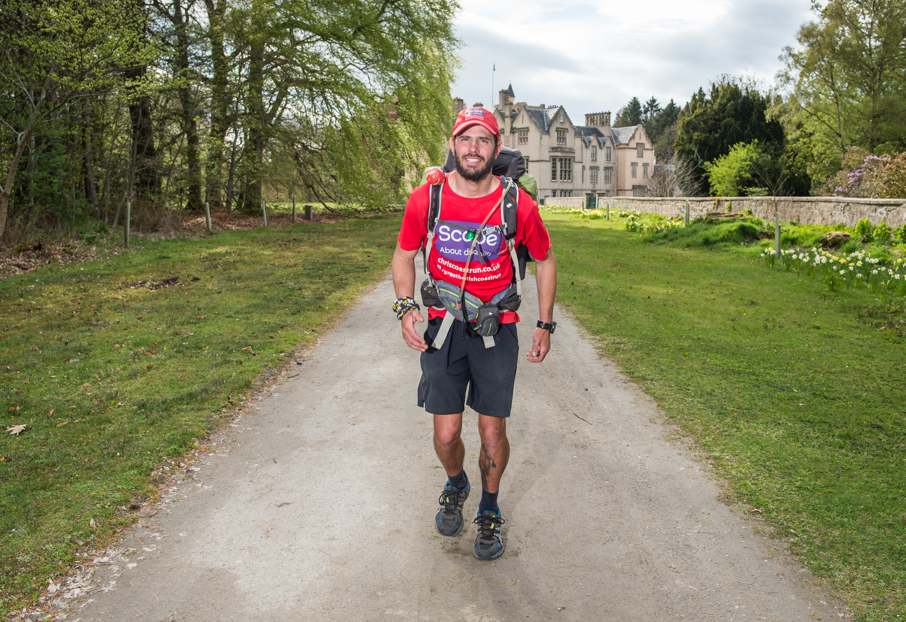 Chris Shipley who is currently running around the coast line of the UK running near Brodie Castle in Moray.