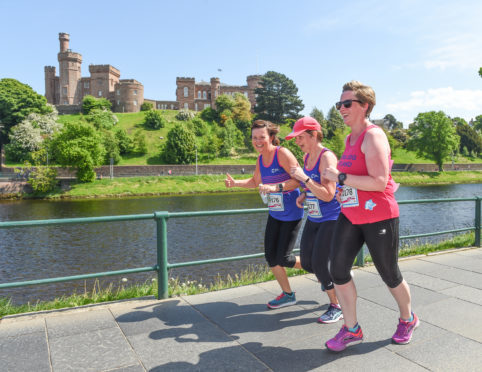 Runners taking part in the Race For Life event earlier this year on the Riverside Way.