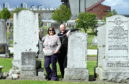 Pauline Gerrard of Aberdeen Cemeteries, at the Trinity Cemetery, Aberdeen, with council gardener Jim Duthie.     
Picture by Kami Thomson