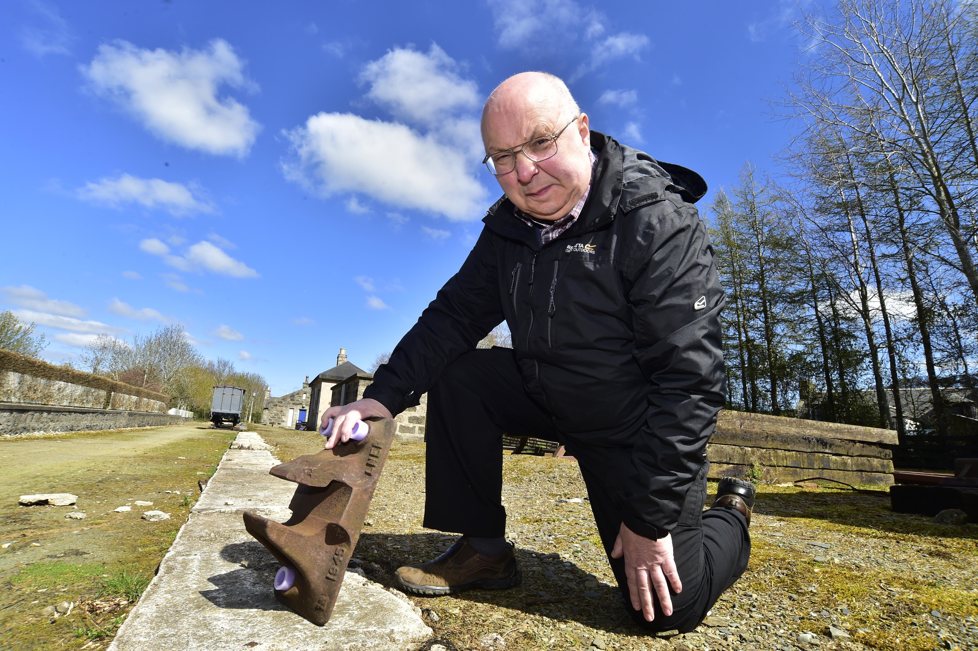 Alistair Robertson from Maud Railway Museum with one of the railway chairs the thieves left behind.